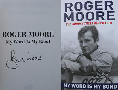 Roger Moore and Bond change books. Roger Moores   "My word is my Bond"  JAMES BOND 007 MUSEET
