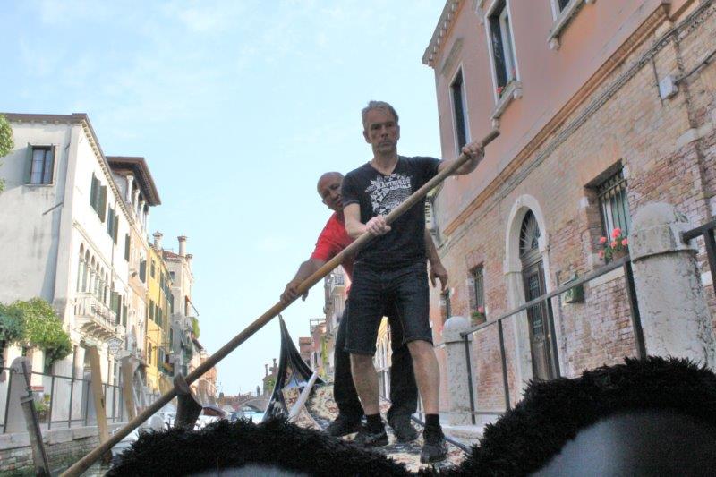 Gondolier Ettore ltry to learn Mr James Bond how to do...Gondolier Ettore ltry to learn Mr James Bond how to do...in Venice canal